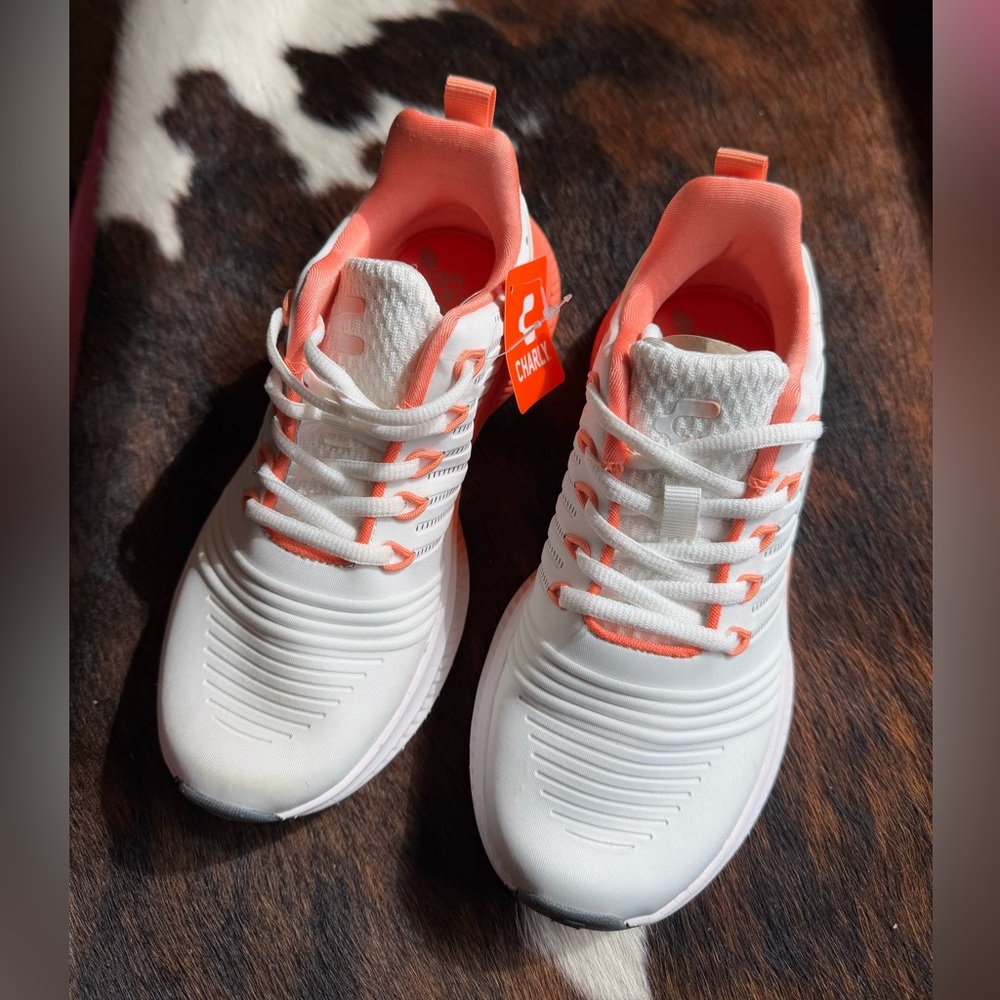 White and Orange Athletic Shoes